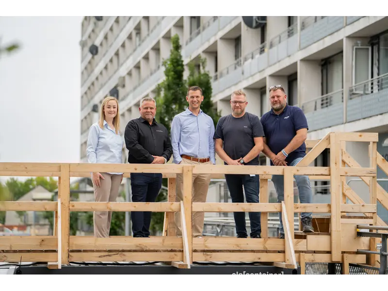 Gruppe af medarbejdere og samarbejdspartnere.